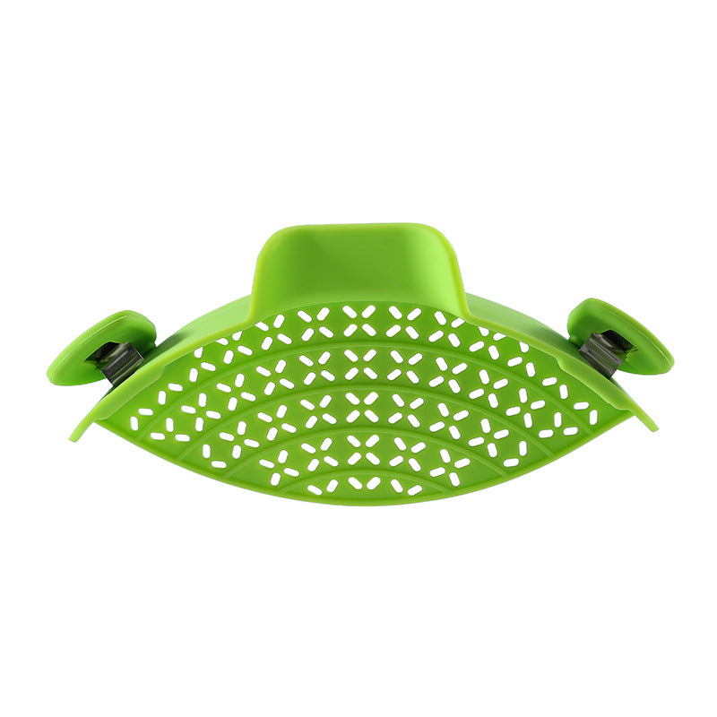 Green perforated silicone clip-on pot strainer