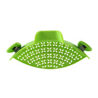 Green perforated silicone clip-on pot strainer