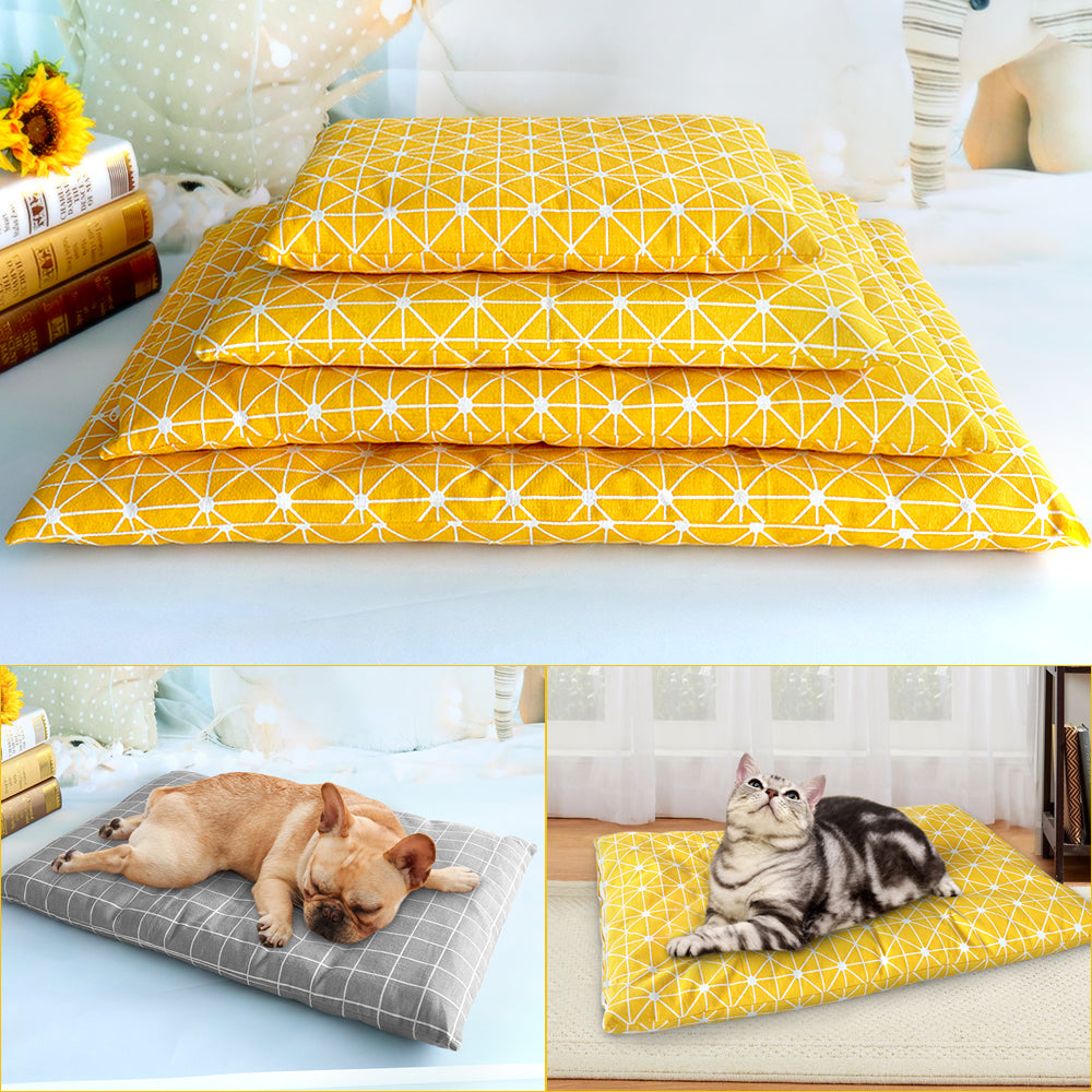 Stack of four yellow pet bed mats in different sizes with dog and cat photos