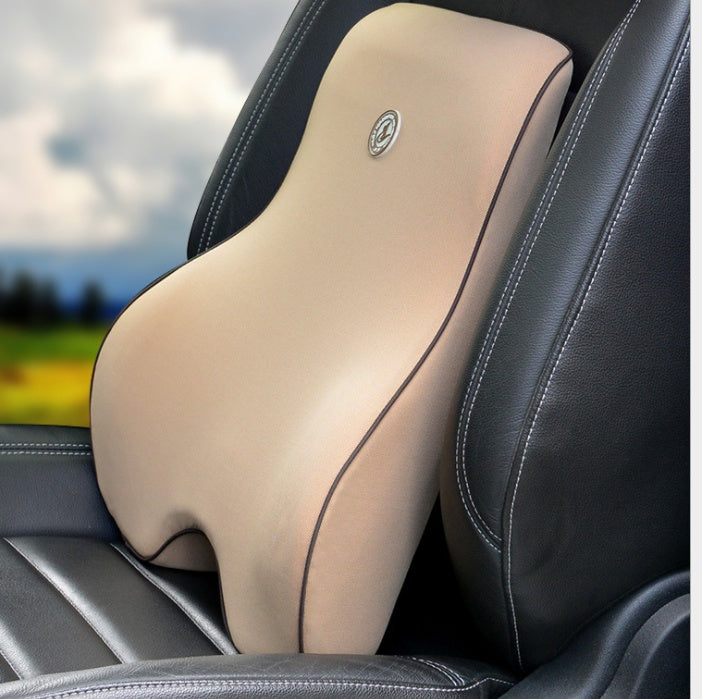 Beige car seat back support on a car seat