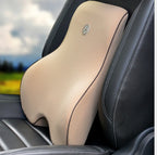 Beige car seat back support on a car seat