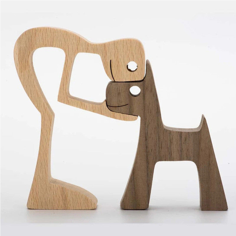 Wooden person and dog figurine, Style 12: tall person bending toward a dog