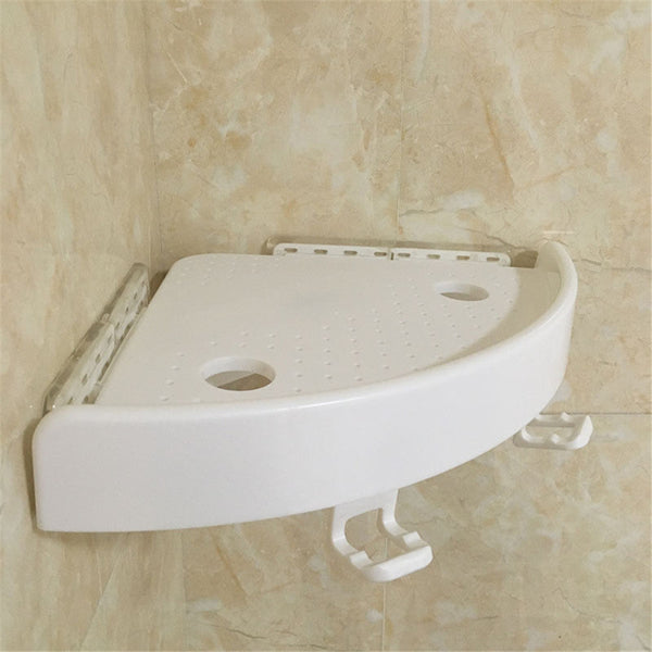 White corner shelf organizer mounted in a corner