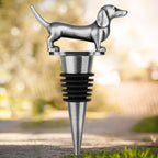 Dark Silver dachshund wine stopper on an outdoor path