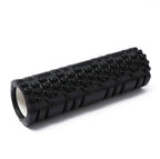 Person lying on a blue textured foam roller