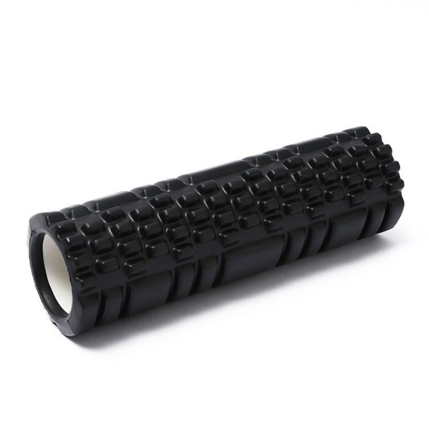 Person lying on a blue textured foam roller