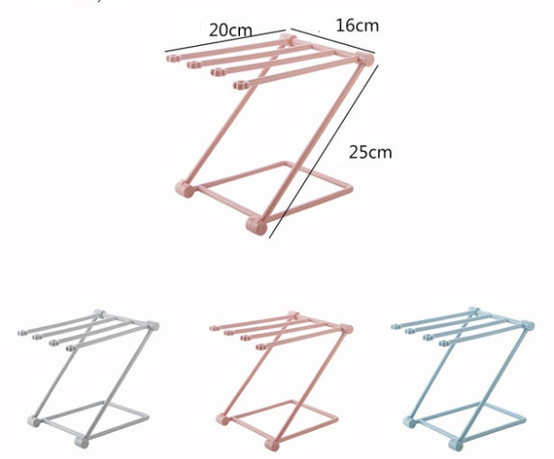 Gray folding dish cloth rack on a white background