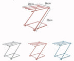 Gray folding dish cloth rack on a white background