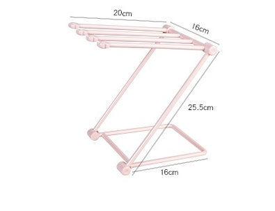Blue folding dish cloth rack on a white background