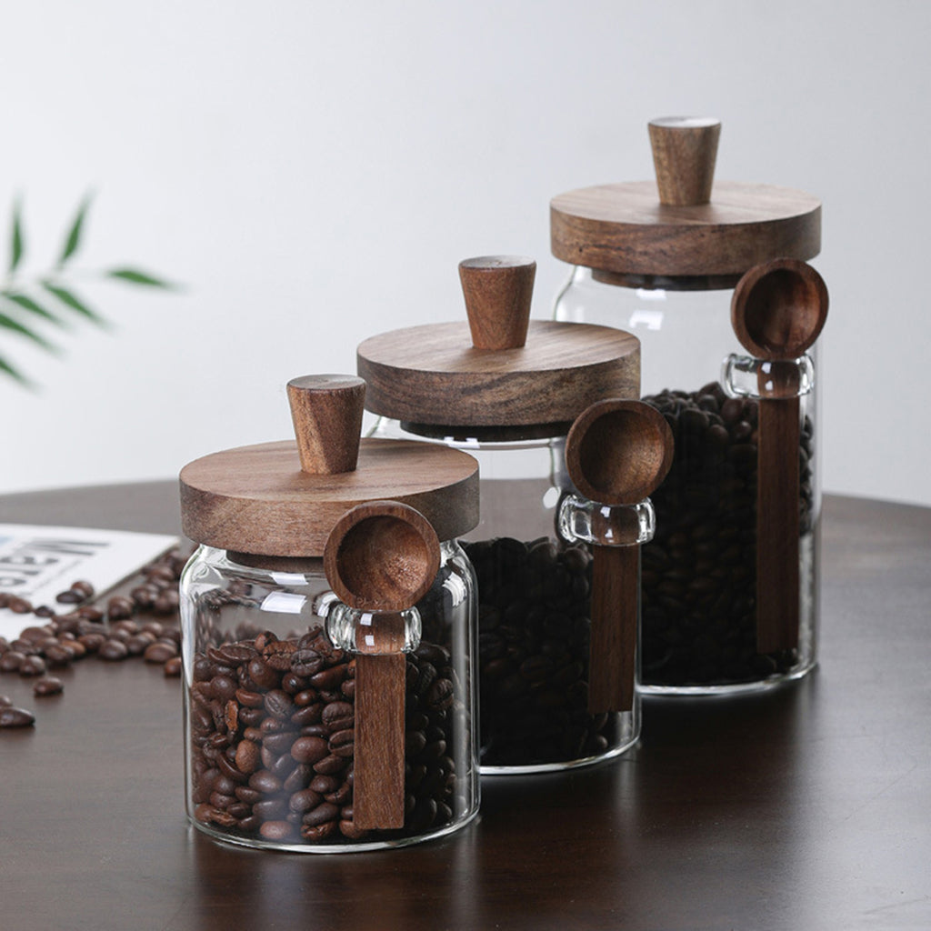 Glass storage jars filled with coffee beans