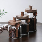 Glass storage jars filled with coffee beans