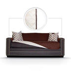 Reversible quilted sofa cover turned back to show the coffee side and the cream reverse side