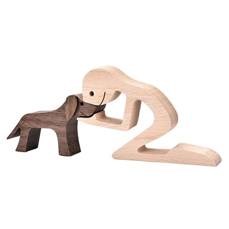 Wooden person and dog figurine, Style 20: kneeling person with a small dog