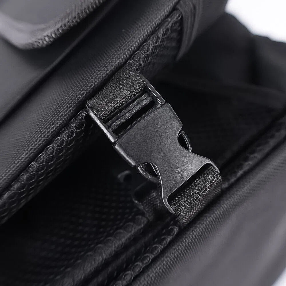 Close-up of the plastic side buckle and strap on the organizer