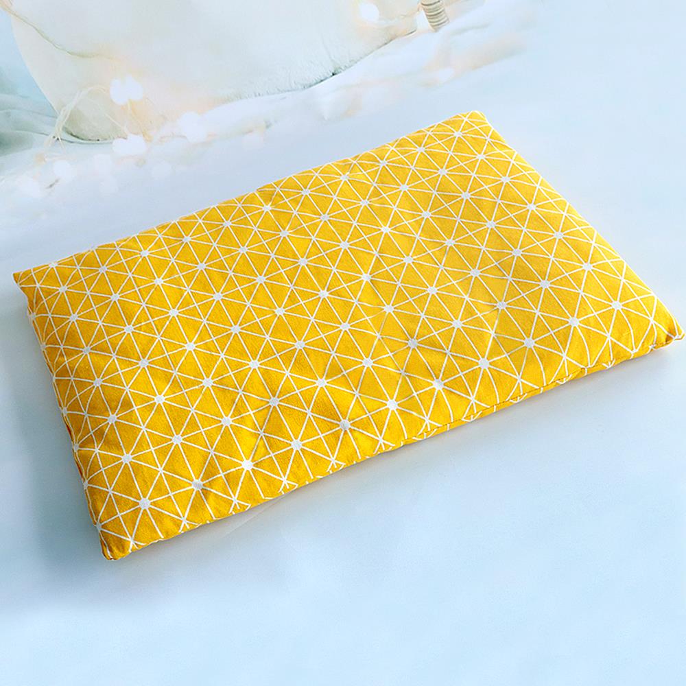 Hand opening the cover of a yellow pet bed mat
