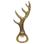 Bronze deer antler bottle opener on a white background