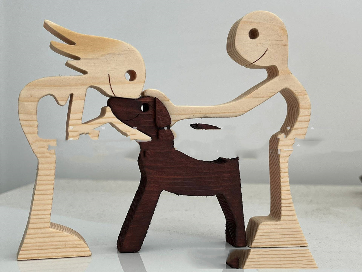 Wooden person and dog figurine, Style 4: standing person reaching toward a dark wood dog