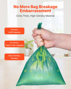 Dog poop bags in use on a walk