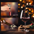 Hand placing a cat wine stopper in a bottle, with a glass of red wine