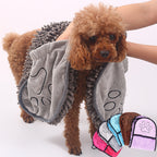 Brown poodle dried with a grey pet towel, other colours in the corner