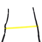 Yellow agility ladder folded beside its carry bag