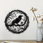 Black iron raven wall art on a living room wall