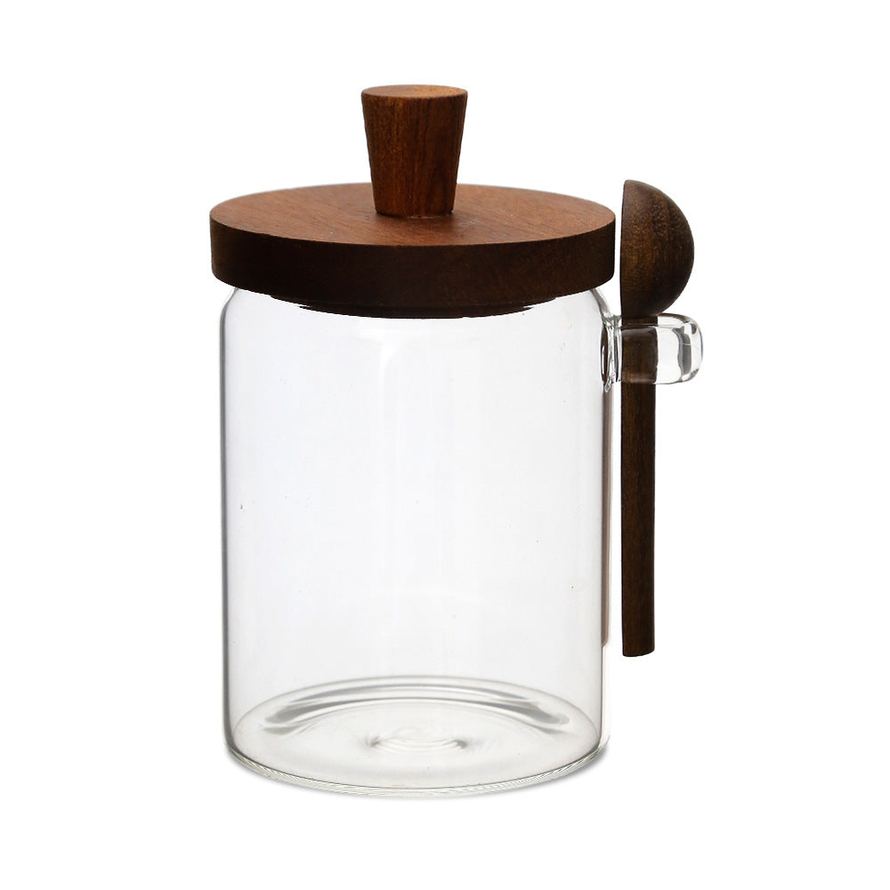 18.5 oz glass coffee storage jar with wood-tone lid and spoon