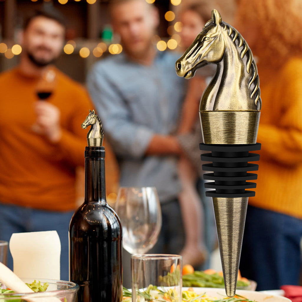 Bronze horse head wine stopper at a dinner party