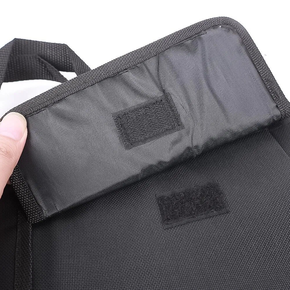 Close-up of the fabric flap and stitching on a black trunk organizer