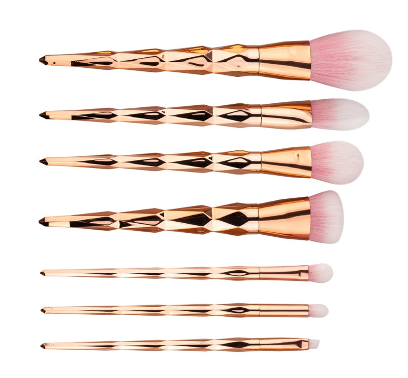 Three colourways of the seven-piece makeup brush set shown together