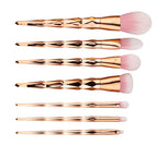 Three colourways of the seven-piece makeup brush set shown together