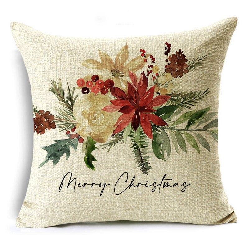 Square linen-look throw pillow cover printed with a poinsettia, pine cone and berry bouquet and Merry Christmas script