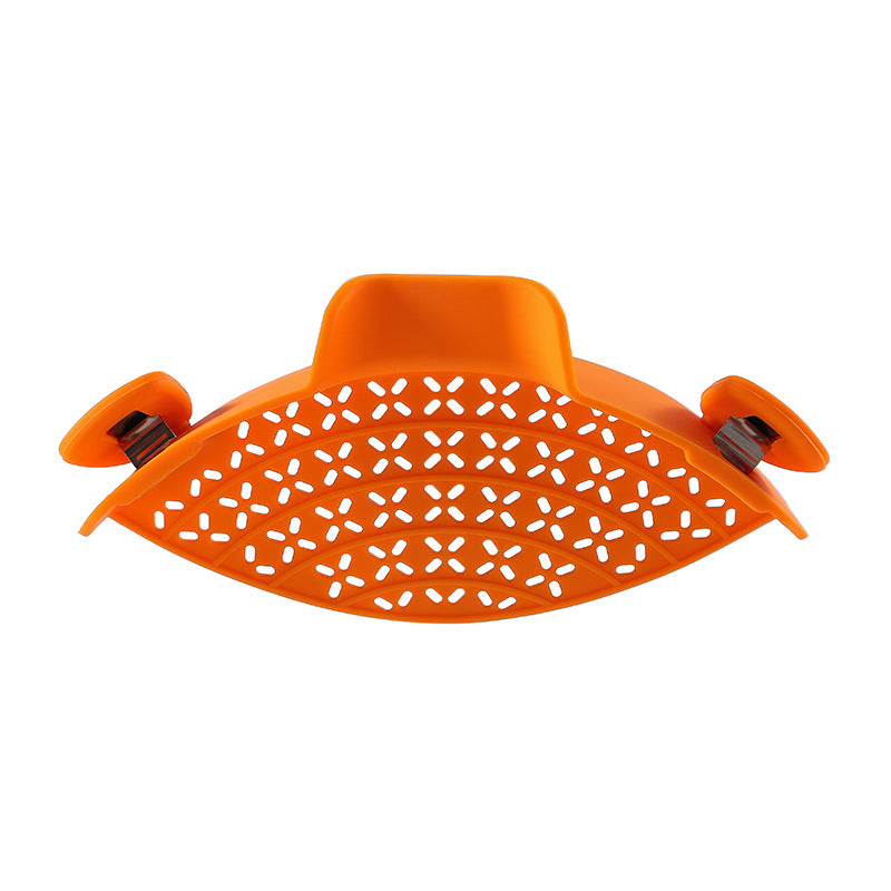 Orange perforated silicone clip-on pot strainer