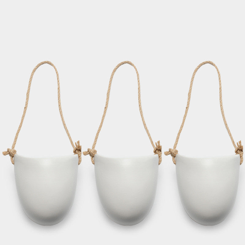 Set of three wall-mounted ceramic planters