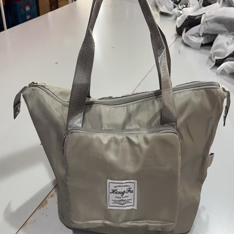 Medium grey foldable travel duffel bag