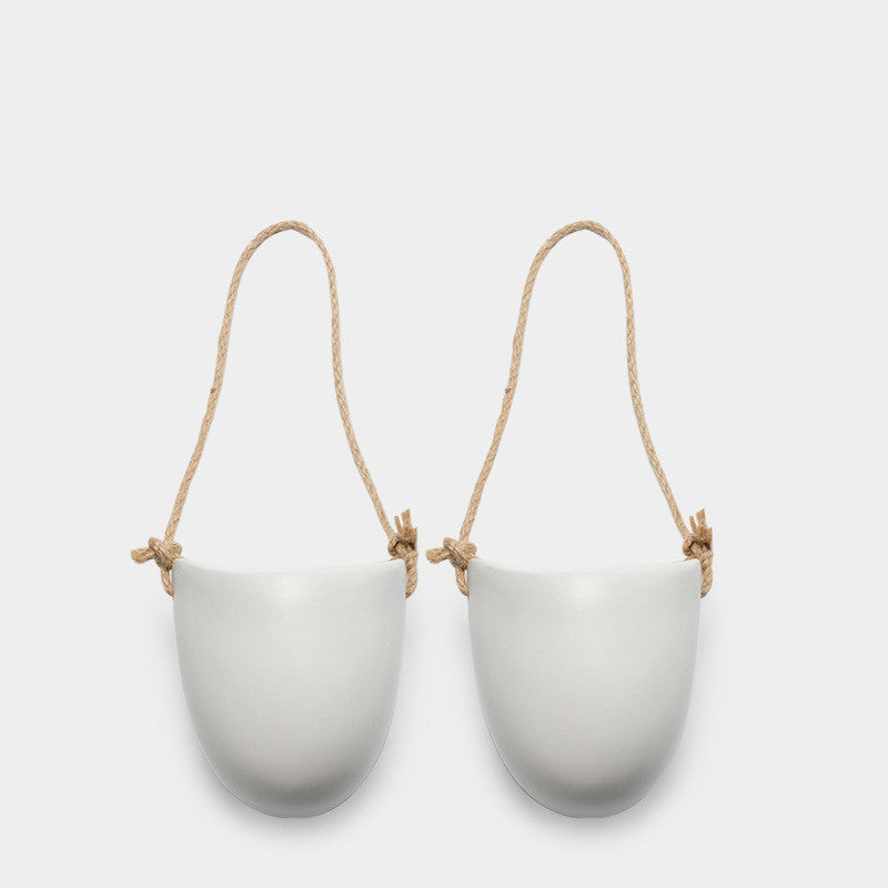 Pair of wall-mounted half ceramic planters