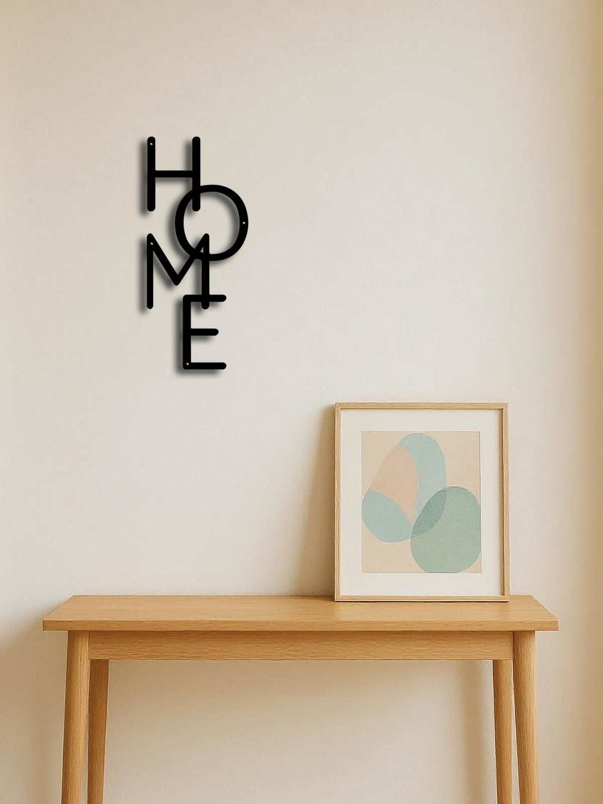 Black metal HOME letter wall sign