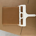 Top view of the sliding pizza peel showing the fabric belt, wooden bar and handle