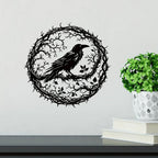 Raven wall art beside a plant
