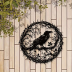 Raven wall art on wooden fence