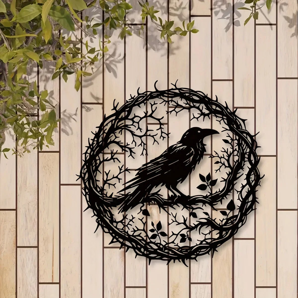 Raven wall art on wooden fence